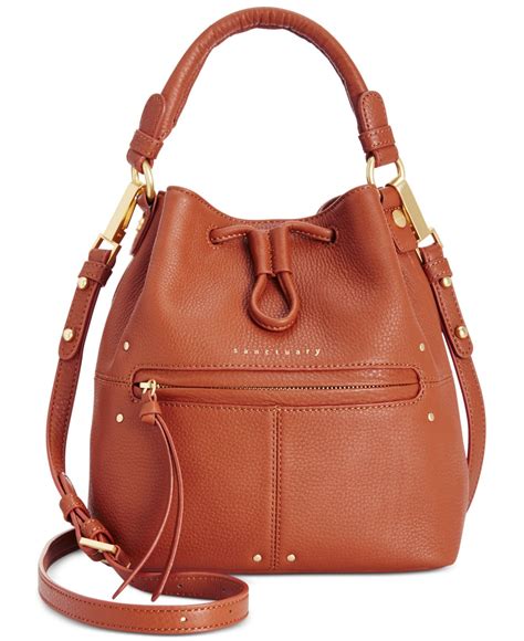 Mini bucket shoulder bag in brown leather 